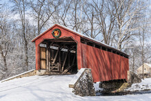 Beautiful Red Covered Bridge On Snowy Day In Lancaster  County, Pennsylvania 