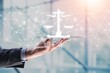 © BillionPhotos.com - Justice and law concept. Legal advice. Hand hold tablet with digital hologram