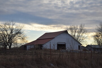 Canvas Print - White Barn in a Field