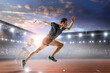© Sergey Nivens - Man in sportwear running . Mixed media