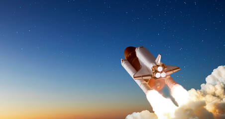 Wall Mural - spaceship takes off into the night sky on a mission. rocket starts into space concept.elements of th
