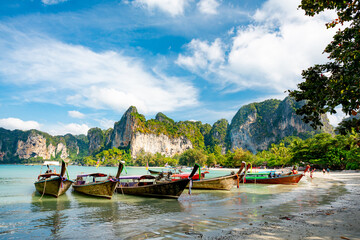 Wall Mural - Krabi, Thailand. Beach and long tail boats.