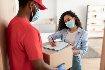 Wall Mural - Customer In Medical Face Mask Receiving Order Signing Paper Form