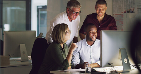 Poster - There's no team better. Cropped shot of a group of businesspeople working together on a computer in their office.