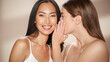 © Gorodenkoff - Sensual Beauty Portrait of Two Diverse Multiethnic Models on Isolated Background. Beautiful Happy Asian and Caucasian Women with Natural, Healthy Skin. Wellness, Spa, Cosmetology and Skincare Concept.