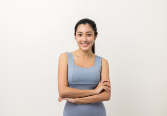 Wall Mural - Young beautiful asian woman with sportswear on isolated white background. Portrait sporty woman standing pose exercise workout in studio.