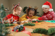 © New Africa - Cute little children making beautiful Christmas greeting cards at home