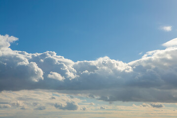 Wall Mural - Cumulus clouds with blue sky on a sunny day of summer. Beautiful cloudscape