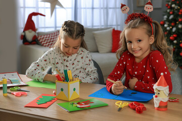 Poster - Cute little children making beautiful Christmas greeting cards at home