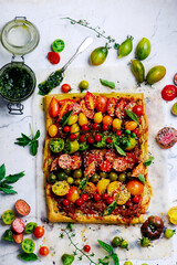 Cheese tomato and pesto  tart.style rustic.