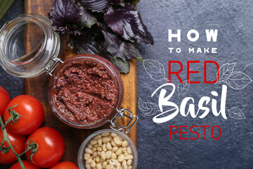 Jar of tasty red pesto sauce and ingredients on dark background