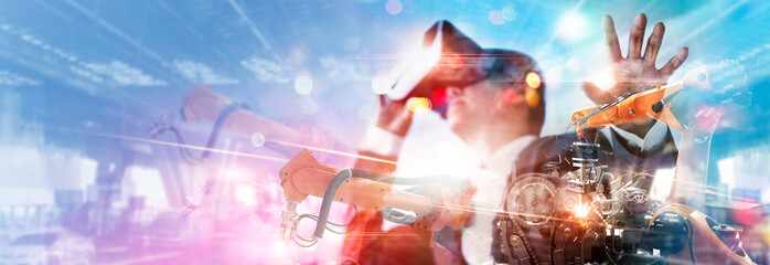 Poster - Metaverse Technology. Manager engineer use VR virtual reality goggle analyzing and control automation robot arms machine on metaverse virtual world data real time, Industrial of futuristic.