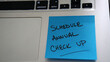 © MKPhoto - Sticky note reminder to schedule annual check up.