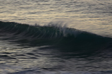 waves at sunset in the Canary Island contemplating its colors and horizon