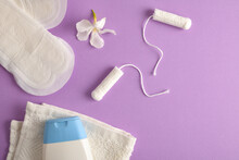 Menstrual Products And Intimate On Lilac Base Top View