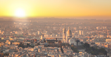 Fototapete - Panorama of Paris with Sacre Coeur Cathedral during golden hour in Paris, France