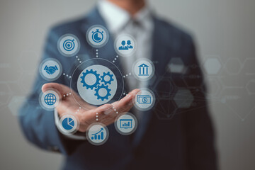 Aufkleber - With gears and icons in the backdrop and a connecting line network, a diagram of business process management and workflow automation is shown. The interface is being interacted with by the manager.