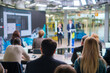 © Anton Gvozdikov - People gathering in modern hall during business forum