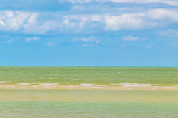 Natural Holbox island beach sandbank panorama turquoise water waves Mexico.