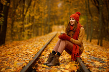 Beautiful Autumn Portrait Of Woman In Forest