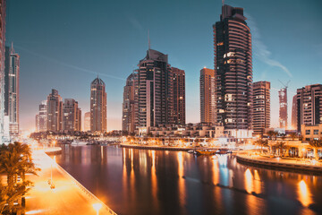 Wall Mural - DUBAI, UAE - FEBRUARY 2018: View of modern skyscrapers at night  in Dubai Marina in Dubai, UAE.