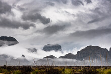 Inverted Clouds Look LIke.A Wave Crashing Over Chisos Mountains