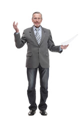 Full length portrait of a mature businessman looking at documents