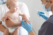 © Angelov - Pediatrician makes vaccination to small boy
