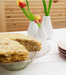 Lasagna's assembly on a white table.