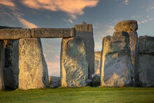 Stonehenge Rocks Up Close During Morning Hours With Pink Clouds In The Background