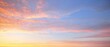Clear blue sky with glowing pink and golden clouds after the storm. Dramatic sunset cloudscape. Concept art, meteorology, heaven, hope, peace. Graphic resources, picturesque panoramic scenery