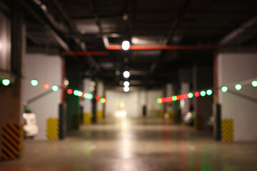 Wall Mural - Blurred view of modern car parking garage