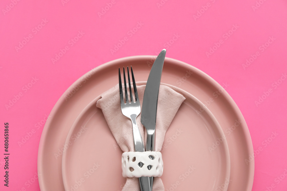 Stylish table setting on pink background