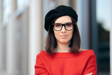 Smiling Chic Woman Wearing A Beret And Eyeglasses