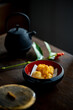 Japanese rice crackers “Okaki” in a bowl.
Japanese traditional snack image.
