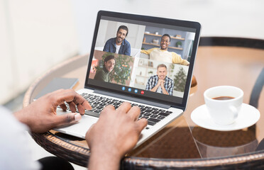 Wall Mural - Remote Communication. Unrecognizable Black Man With Laptop In Cafe Having Video Conference