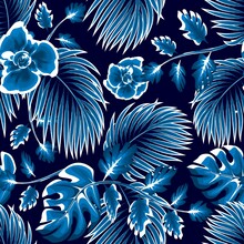 Blue Monochromatic Palm Leaves Seamless Pattern With Tropical Monstera Plants Foliage And Abstract Flowers On Night Background. Floral Background. Exotic Tropics. Summer Design. Jungle Illustration  