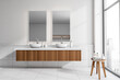© ImageFlow - Bathroom interior with sink and mirror, accessories on table and window