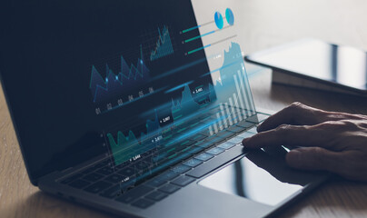 Laptop with information graph. Financial and investment concept