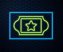Glowing Neon Line Cinema Ticket Icon Isolated On Brick Wall Background. Vector