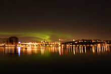 Northern Lights, Or Aurora Borealis, Over Stockholm City Skyline On A Winter Night. Night View Of Södermalm In Stockholm, Sweden When Northern Lights Is Displayed. Photo Taken January 15, 2022.