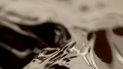 Canvas Print - Super slow motion of dark hot chocolate splashing, close-up. Filmed on high speed cinema camera, 1000fps.