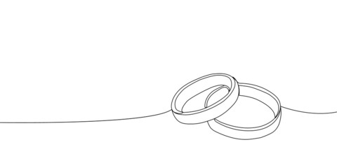 Wedding rings continuous line drawing. One line art of love, rings, marriage, union of hearts.