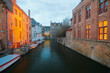 Canals in the evening light in the historic city centre of Bruges in Belgium