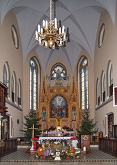 Wall Mural - Exterior and interior view of the Neo-Gothic Catholic Church of the Transfiguration of Jesus built in 1907 in the village of Poświętne in Podlasie, Poland.