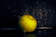 Yellow Apple In Water