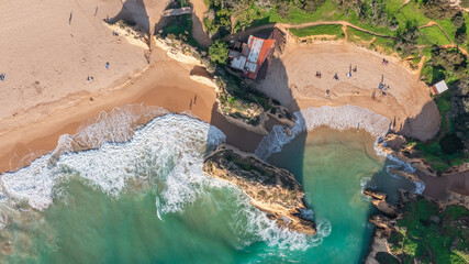 Sticker - Aerial view of beautiful Portuguese beaches with rocky sandy shores and pure sand for tourists recreation in the Algarve in the south.