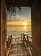 Beautiful dor way to white beach with sunrise in background. Zanzibar