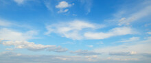 Blue Sky With Beautiful White Clouds. Wide Photo.