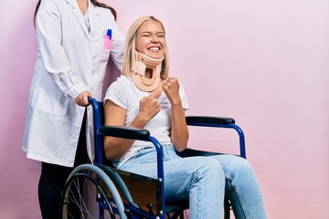 Poster - Beautiful blonde woman sitting on wheelchair with collar neck very happy and excited doing winner gesture with arms raised, smiling and screaming for success. celebration concept.